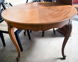 Dining table with extra leaves