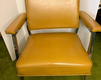 Midcentury modern metal chair with padding and upholstery