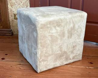 111 beigeupholsteredottomancube