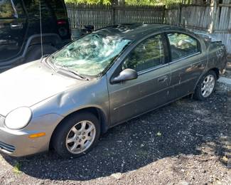 dodge neon, roof damage runs good. new head installed last year