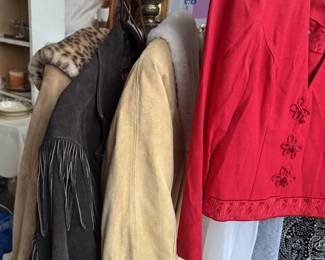 Vintage leather jackets, coats, fringe leather jacket, suede sheepskin coat, suede and animal print coat, red silk blouse, sparkly evening dress