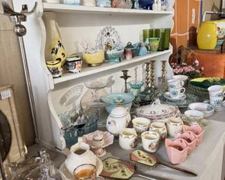 Vintage glassware, planters, pitcher, green glasses, dresser mirror and brush, brass candlesticks, mid century plate and saucer, vases, box