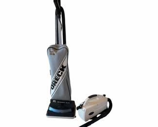 Two Classic ORECK Vacuum Cleaners