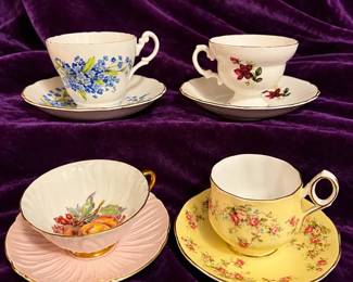 Four Bone China Cups And Saucers