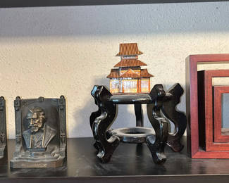 Lot 43: Decorative Bookends, Wooden Stand, and Nested Display Frames
