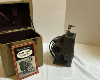 Lot 210: Kodascope Eight-33 Film Projector with Case and Manual