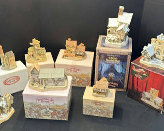Lot 146: David Winter Cottages and Christmas Carol Collectible Buildings