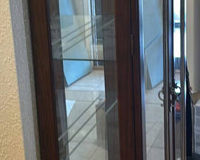 Lot 17: Wood and Glass Curio Display Cabinet
