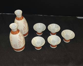 Lot 9: Ceramic Sake Set with Two Bottles and Five Cups
