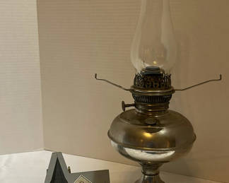 Lot 233: Metal Oil Lamp and St. Paul's Church Decorative Plaque