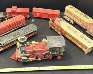 Lot 153: Vintage Toy Train Engines, Cars, and Track Accessories