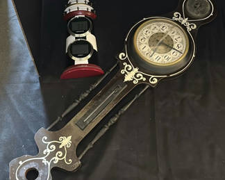 Lot 29: Wall Clock and Lighthouse Thermometer Hygrometer