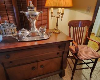 Unique serving pieces and single occasional chairs