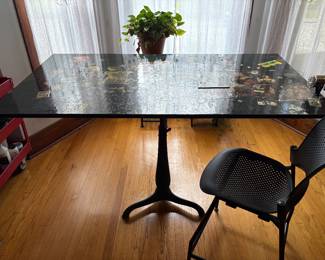 Susan Wise's drafting table, embellished with her decoupage and collage