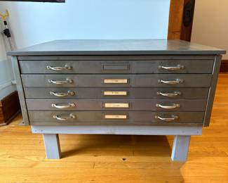gray flat file on stand