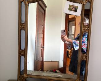 large black and gold mirror