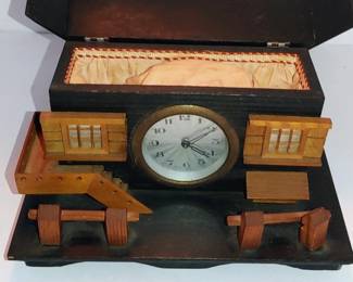 Roof lifts up revealing silk lined jewelry box