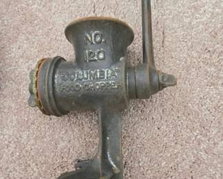 Columbia No. 120 Food Chopper, a manual hand-crank meat grinder made of cast iron.