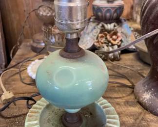 Jadeite Boudoir Lamp 1940-50 A small vintage table lamp featuring a spherical jadeite glass body and a matching fluted saucer-style base joined by rusted metal hardware with a standard socket at the top.