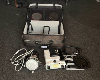 Lot 286: K5600 Joker Bug 200 HMI Light w/ Power Supply, Lenses, Barn Door, Case
