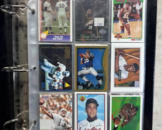 Lot #259 Vintage Sports Card Binder Lot Magic Johnson Barry Sanders Cal Ripken HOF Stars