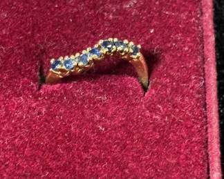 Lot #51 14k Gold Blue Stone Seven-Stone Curved Wedding Band