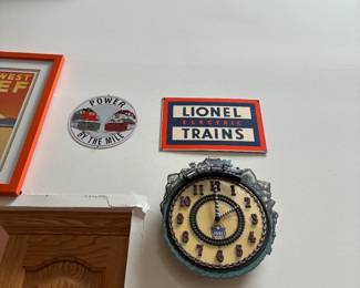 Lionel signs and clock