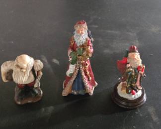 Collection of Three Vintage Resin Santa Claus Figurines