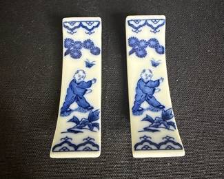 Pair of Blue and White Porcelain Chopstick Rests with Boy Motif