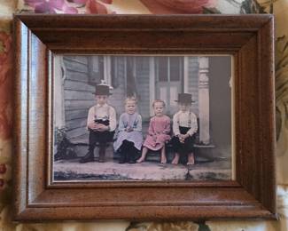Vintage Hand-Tinted Photograph of Four Children in Period Clothing