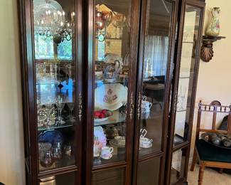 LOVELY DISPLAY CABINET WITH GLASS SHELVES. SOME STEMWARE AND DECOR HAVE BEEN RELOCATED