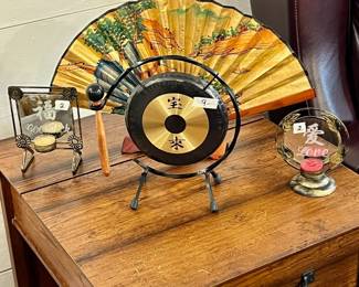 Asian fan, gong, candle holders