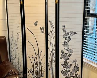 four-panel folding room divider with black wooden frame and white translucent panels