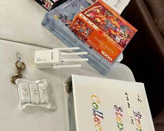 puzzles, wifi extender, brass stencil collection