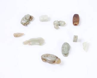 Lot 43 Group of Ten Chinese Carved Hardstone Toggles, Pendants, and Miniature Carvings