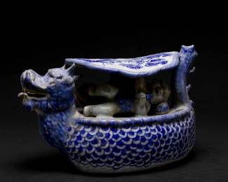 Lot 117 Chinese Blue and White Porcelain Dragon Boat Figure, 20th C.