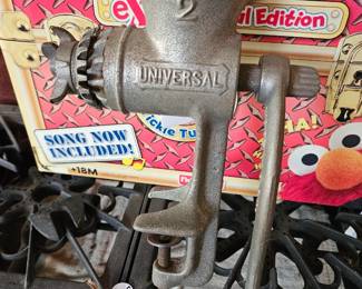 meat grinder and a tickle me elmo in the box