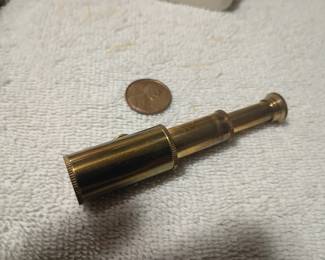 Tiny brass spy glass