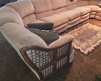 Fully convertible 1980's rattan sofas with recliners