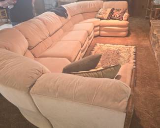 Fully convertible 1980's rattan sofas with recliners