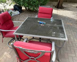 Table And Three Chairs