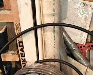 Assorted PVC Rigids, 1-Inch 100-Foot Flexible PE Piping Roll, and Plumbing Fittings Lot
