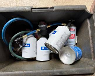 Assorted R-134a Automotive Refrigerant Cans with Interdynamics Quest PSI Pressure Gauge Hose