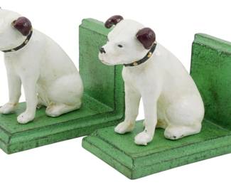 90 - Pr Cast Iron Dog Bookends 5" (Description): Pair of cast iron dog bookends featuring  seated white terriers with brown ears and  studded black collars. The dogs are mounted  on green painted L-shaped bases. Each bookend  measures 5 inches.