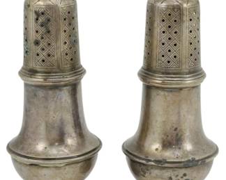 235 - Stieff Sterling Salt and Pepper Shakers 5.5" (Description): 6.5 oz - Pair of Stieff sterling silver salt  and pepper shakers measuring 5.5 inches tall.  The shakers feature elegant baluster-form  bodies with circular pedestal bases. The  pierced domed lids display a decorative lattice pattern with diamond-shaped  perforations, topped with turned finials. The  silver shows a warm aged patina consistent  with vintage sterling pieces.