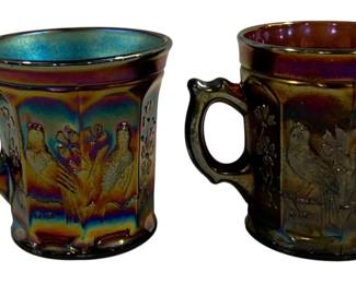 2331 - 2 Northwood Singing Birds Carnival Glass Mugs 3.5" (Description): A set of two carnival glass mugs featuring  iridescent finishes. Each mug measures 3.5  inches in height.