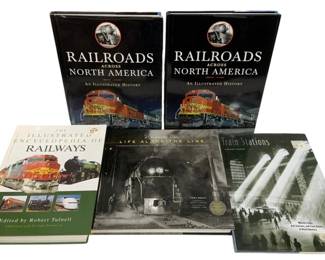 1066 - 5 Railroad & Train Books (Description): A collection of six books focused on  railroads and trains. The lot includes titles  covering railroad history across North  America, an illustrated encyclopedia of  railways, and books featuring train stations and rail photography. A nice grouping for the  railroad enthusiast or collector.