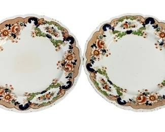2327 - 2 English John Maddock "Bombay" Plates 8" Round (Description): A two piece set of "Bombay" plates featuring  decorative floral borders. Each plate  measures 8 inches round.