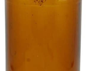 251 - Vintage Amber Clorox Bottle 9.5" (Description): Vintage amber glass Clorox bottle featuring  embossed "CLOROX" lettering around the  shoulder of the bottle. This classic  household bottle retains its original  screw-top cap and displays the characteristic golden-amber coloring typical of early  Clorox containers. The bottle measures 9.5  inches in height.