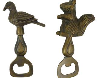 165 - 2 Figural Animal Bottle Openers (Description): 2 Figural bottle openers featuring animal  designs. One opener is topped with a bird  figure, while the other features a squirrel.  Both have matching teardrop-shaped handles  leading to the opener mechanism at the base.